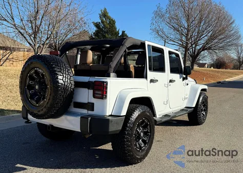 2015 Jeep Wrangler Unlimited Sahara from USA, damaged, VIN 1C4BJWEG9FL646451